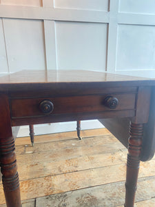 English mahogany Pembroke table on castors