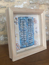 Load image into Gallery viewer, Original watercolour and pen, French shutters, framed in a contemporary frame
