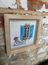 Load image into Gallery viewer, Original watercolour and pen, French shutters and bicycle framed in a contemporary frame
