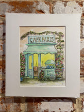 Load image into Gallery viewer, ❌SALE❌was £125 now £95 Original watercolour and pen, French cafe scene framed in a warm off white card mount by Jason M Parker
