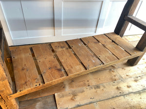 Restored garage work bench with reclaimed shelf