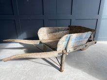 Load image into Gallery viewer, Washed out blue French wooden wheelbarrow
