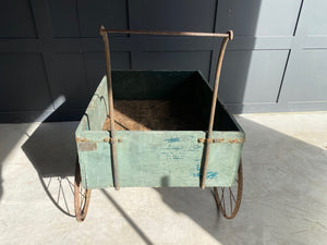 Washed out blue French wooden flower cart