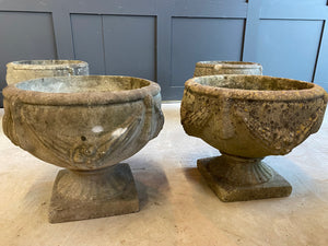 4 Weathered reconstituted stone planting urns