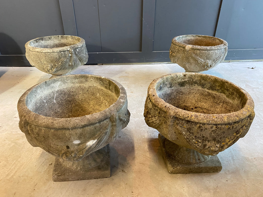4 Weathered reconstituted stone planting urns
